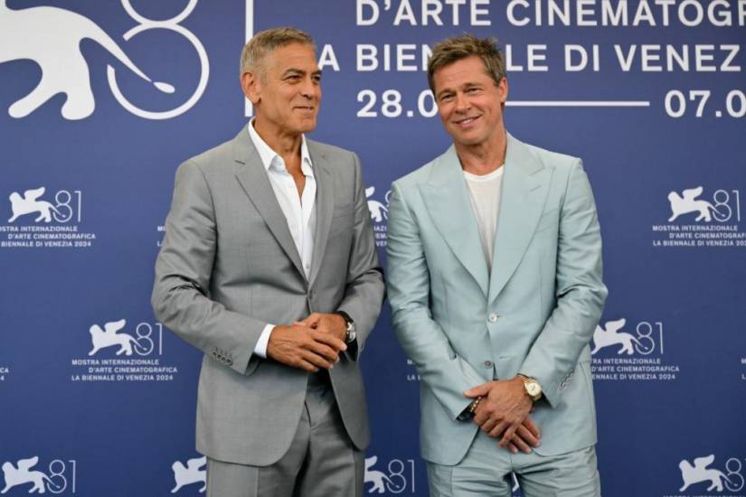 AFP | Los actores George Clooney y Brad Pitt.