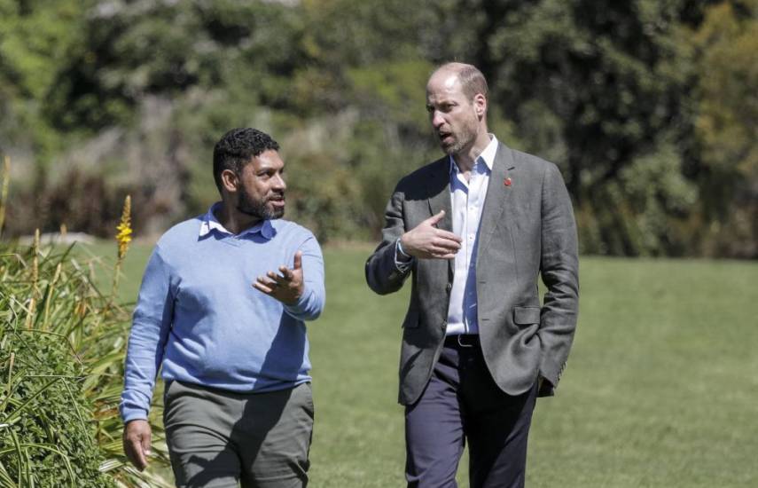 Britain's Prince William (R), Prince of Wales, walks with Garden Director Werner Voigt (C) before meeting with the 2024 Earthshot Prize Finalists at Kirstenbosch National Botanical Garden in Cape Town on November 6, 2024. (Photo by GIANLUIGI GUERCIA / POOL / AFP)